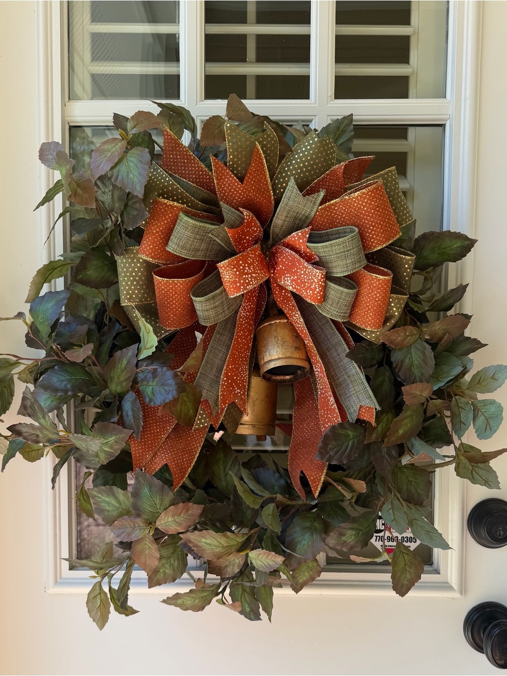 Autumn Leaf Wreath with Orange Bow and Bell -